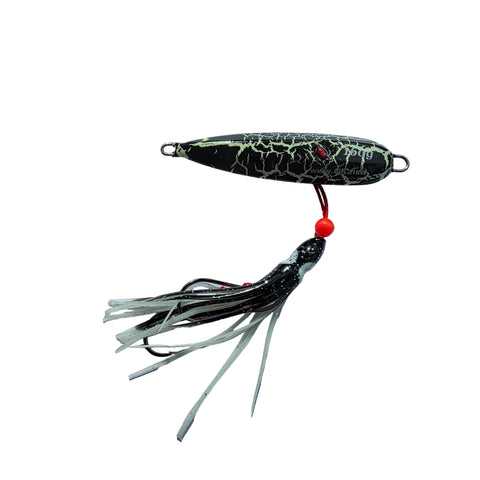 Fishing lure with black and white pattern on a gray background