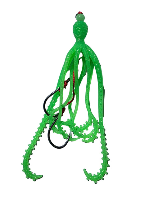 Green fishing lure on a light gray background